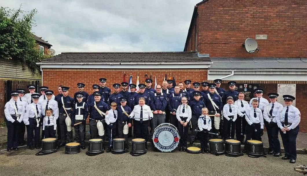 South Belfast Protestant Boys Flute Band group photograph with their drums